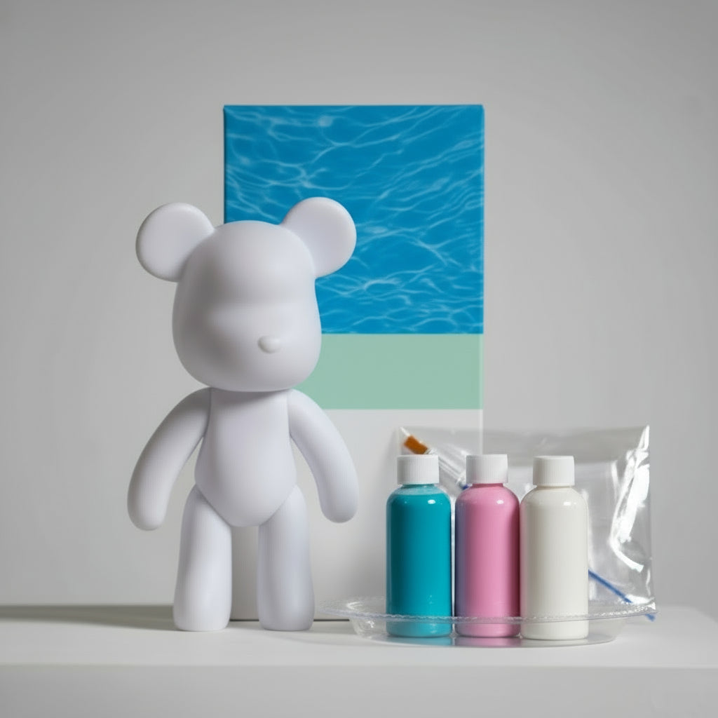 White bear figurine with Bear Build products on a gray surface
